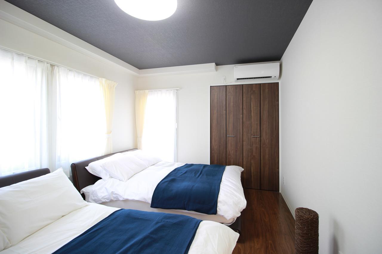 Atrium Apartment Osaka Exterior photo